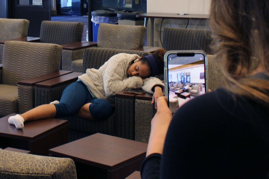 Makayla finds a stranger sprawled out taking a break from their homework in the University Union while checking her favorite sites to catch people napping. Holding her laughter in, Makayla silently takes the picture and sneaks away hoping she has caught a picture that will be posted on to the main account. University Union- 2/7/2020